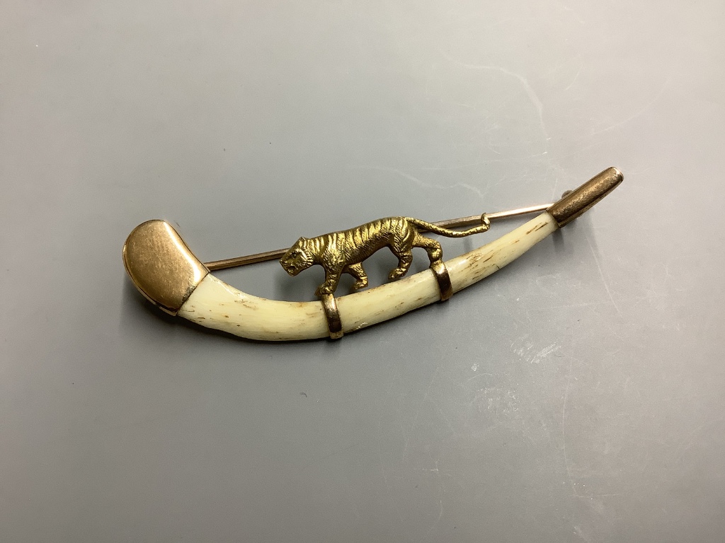 An Indian 14ct and bone mounted 'tiger' set curved brooch, by Hamilton & Co, in original box